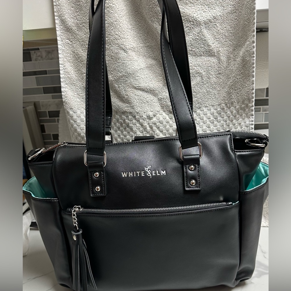 White Elm Gemini Mini convertible backpack-black with beautiful blue/teal lining
